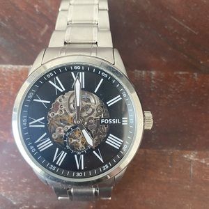 Men’s Fossil Watch, works needs new battery.